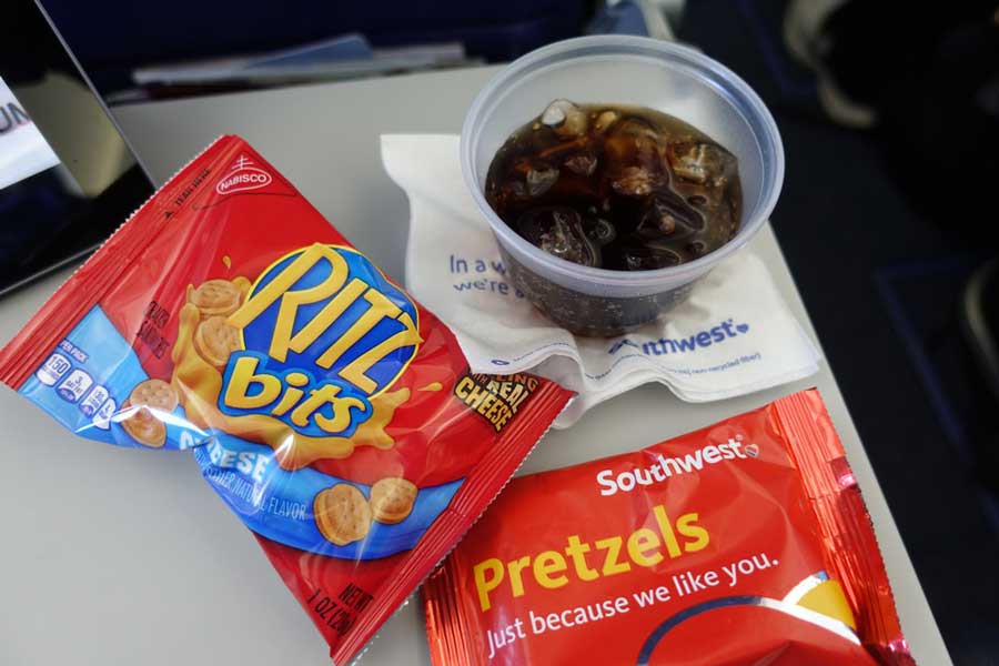 Snacks and a glass of drink during a flight