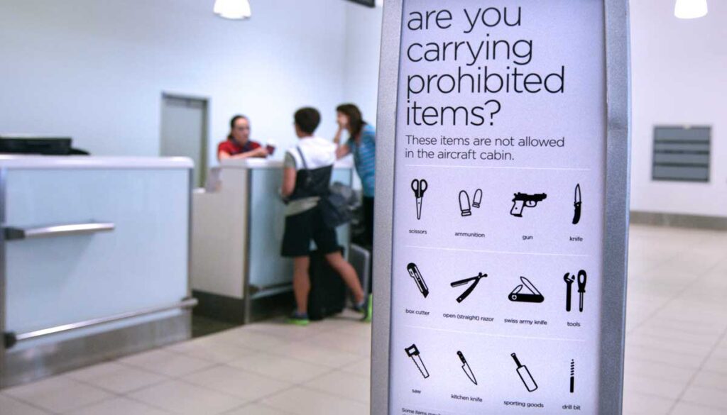 List of prohibited items inside an airport, showing what you cannot and can carry in your purse on a plane